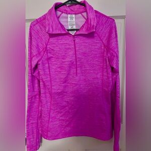Under Armour Women's Authentics 1/4 Zip Pullover in a vibrant pink/purple color.